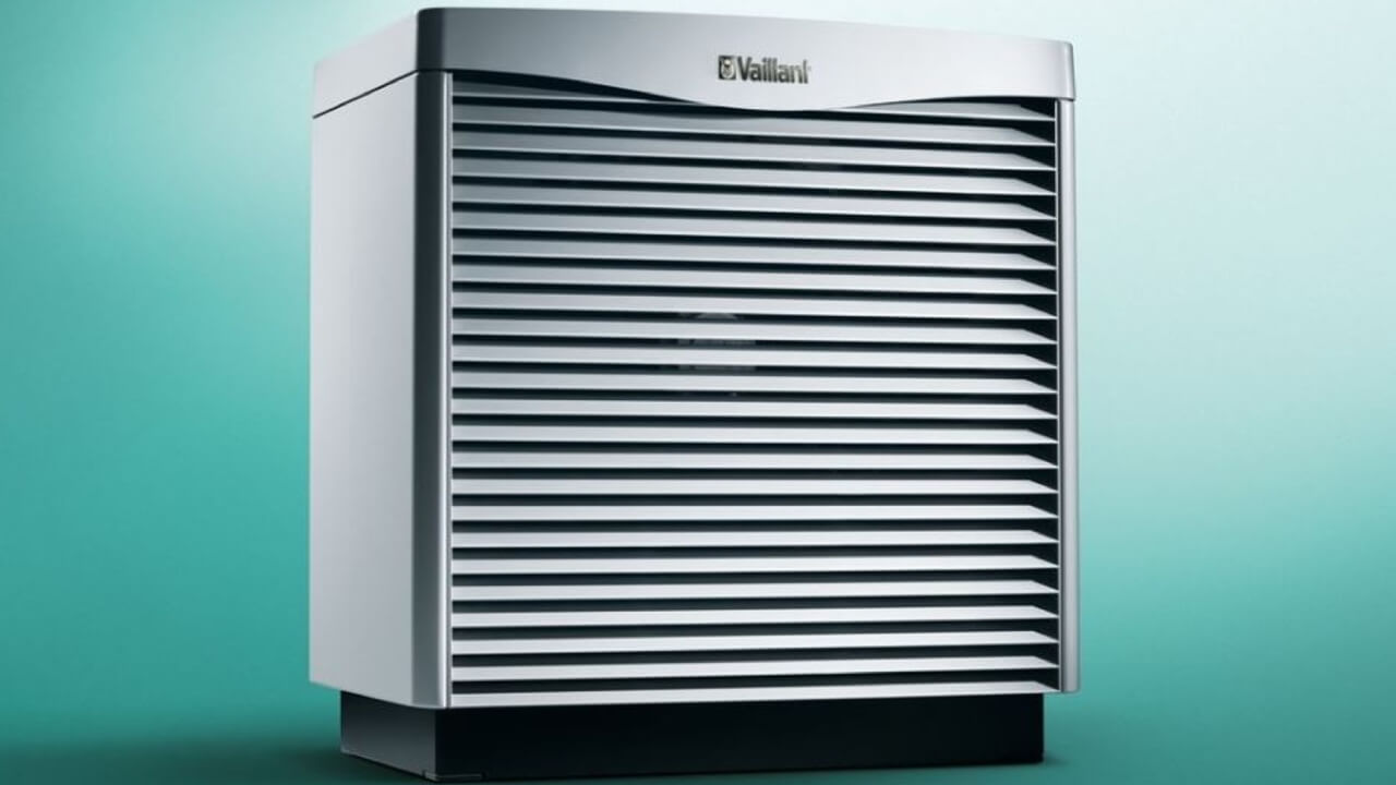 The Vaillant aroCOLLECT air source heat pump module on a teal green background.