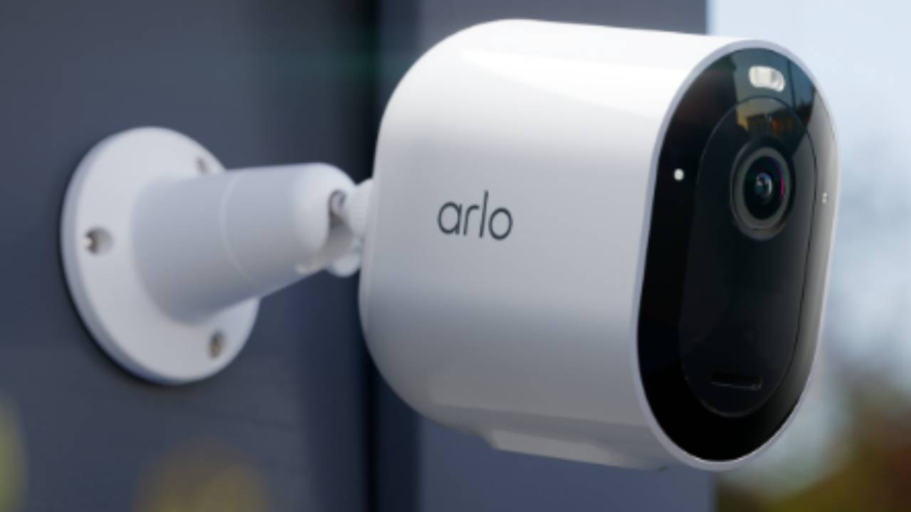 Arlo home security system outdoor camera on wall