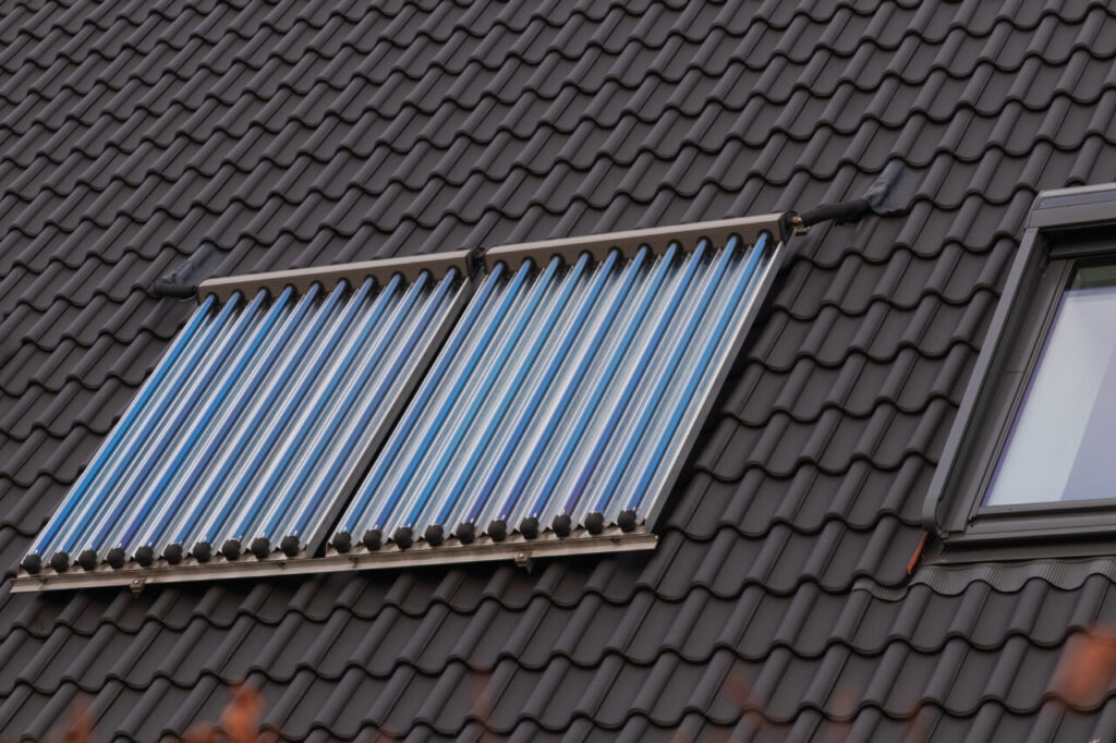 Image shows solar thermal tubes on a rooftop.